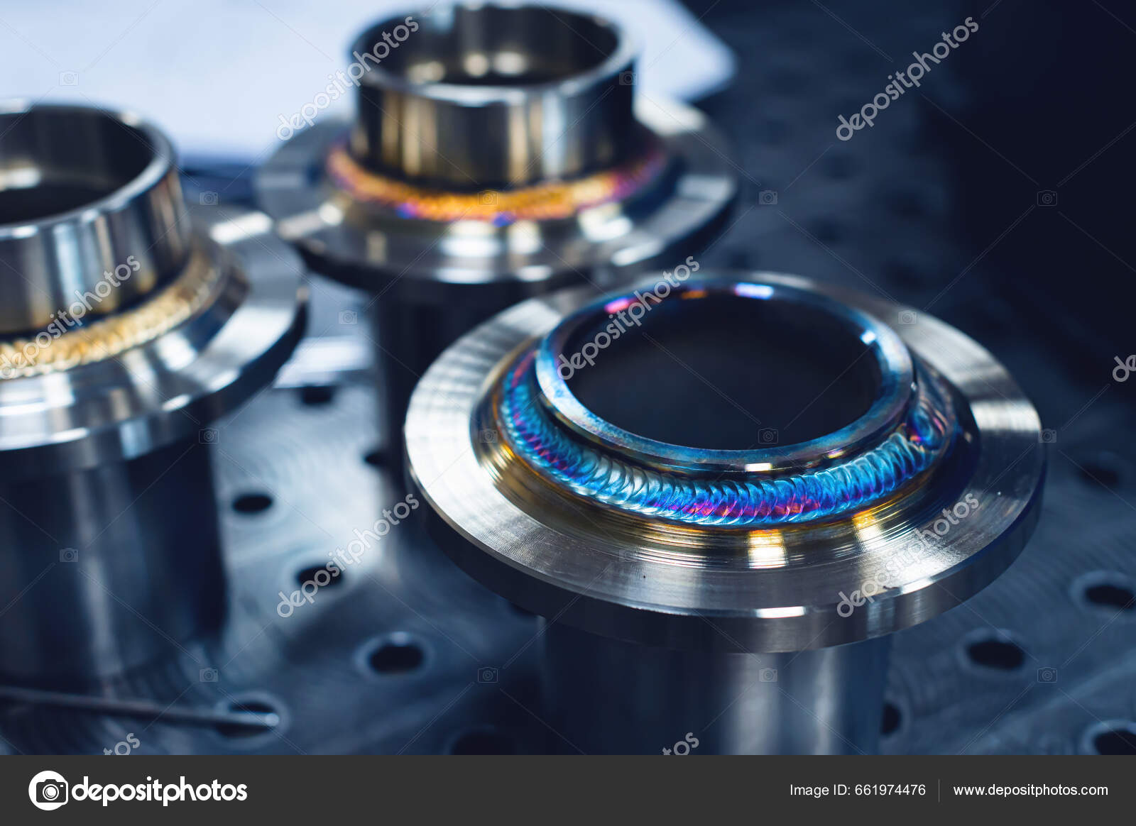 Freshly welded seam on a stainless flange. Production of metal products from stainless steel by welding